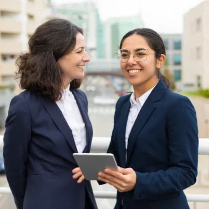 happy-businesswomen-with-digital-tablet